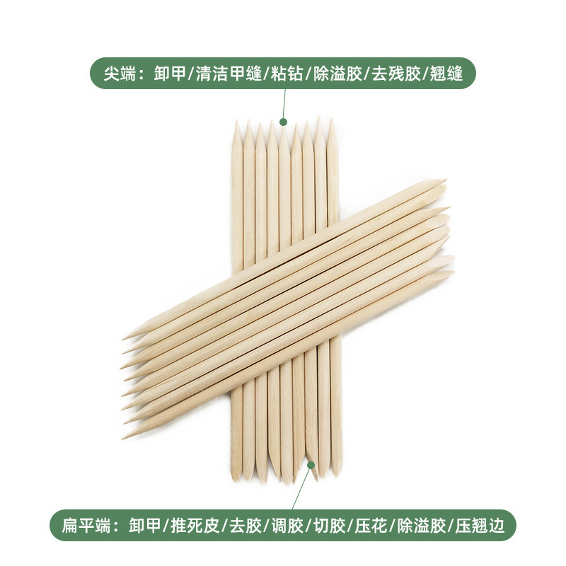 Usar un palo de uñas, un palo de naranja de doble cabeza, un palo de beech, empujar la piel muerta, relieve, pegamento, accesorios de eliminación de uñas para limpiar las juntas de uñas.