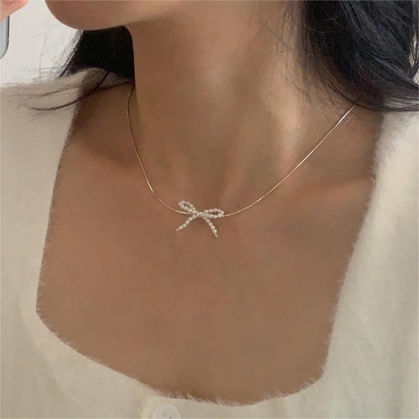 Sterling Silver Simple Style Bow Knot Pendant Necklace display picture 11