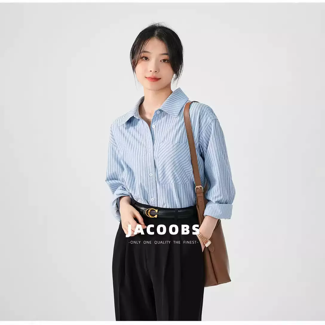 蓝色条纹衬衫女春秋设计感小众OL职业通勤叠穿衬衣设计感