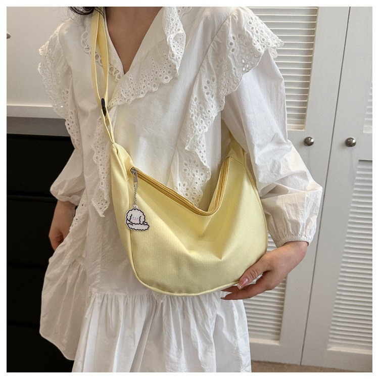 Large capacity canvas shoulder for women in spring summer 2023, new solid color, simple and fashionable casual bag,_voghion.com
