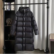 黑金七格鹅绒羽绒服女长款过膝2025年新款情侣男女百搭加厚外套潮