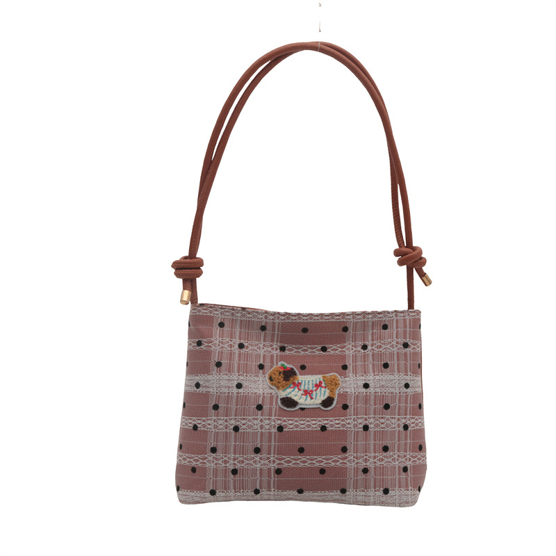 Bolsa de lona popular de este año para mujeres 2024 nuevo bolso de balde de verano de gran capacidad de alta calidad sensación de mochila de viaje