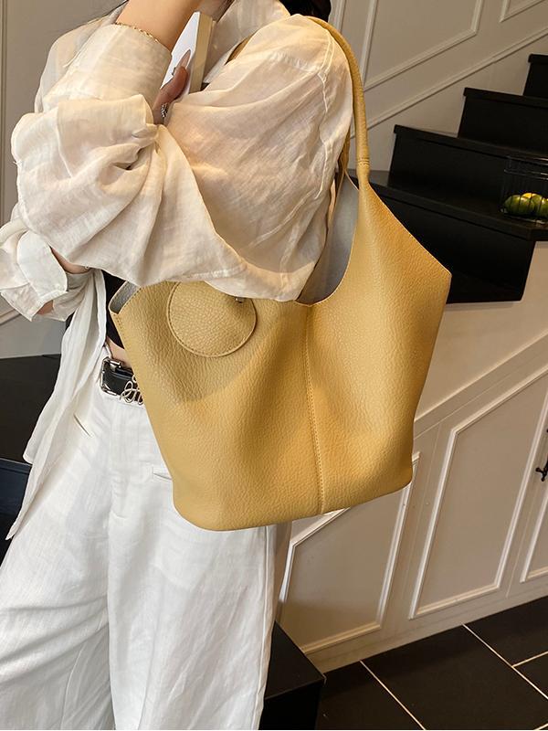 Bolso de cubo de axila de estilo explosivo transfronterizo para mujer 2025 nuevo bolso de hombro de cuero suave de viajero salvaje simple bolso de niño y madre de todo fósforo