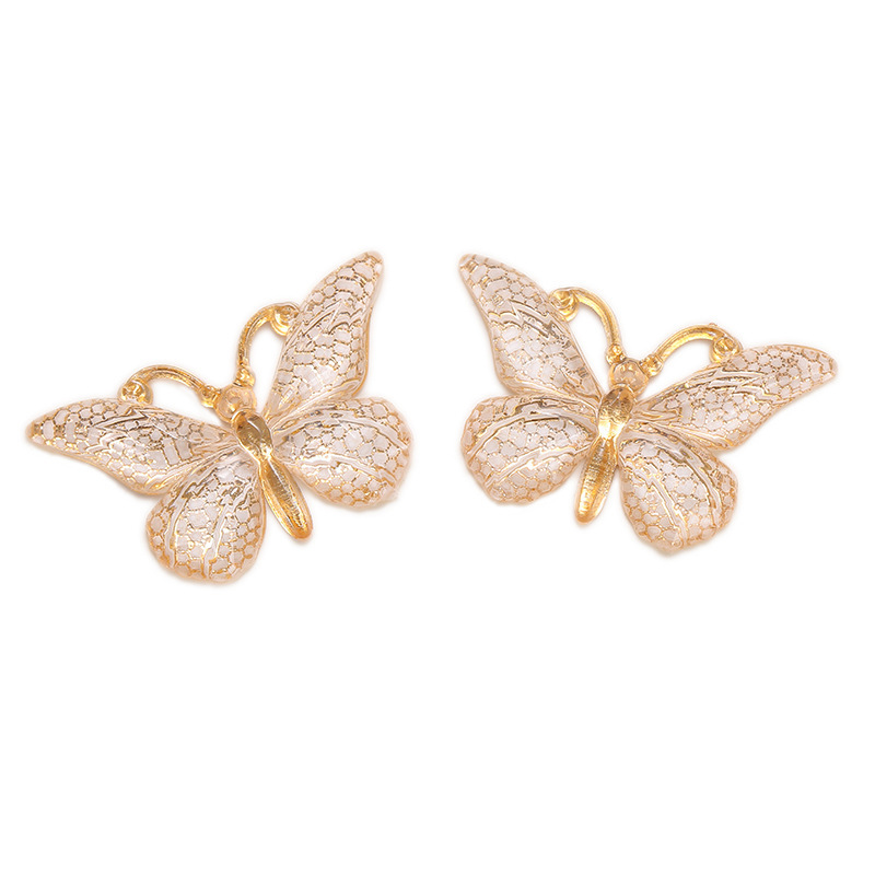 Colgante de mariposa transfronteriza de color creativo de personalidad acrílico europeo y americano bolsas de auriculares bolsas de decoración accesorios