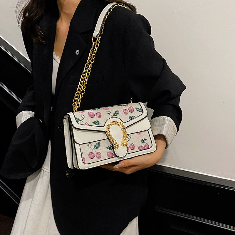 Hong Kong estilo retro Baco 2025 verano nuevo bolso de cadena moda cereza bolso de hombro color de contraste bolso de mensajero para mujer
