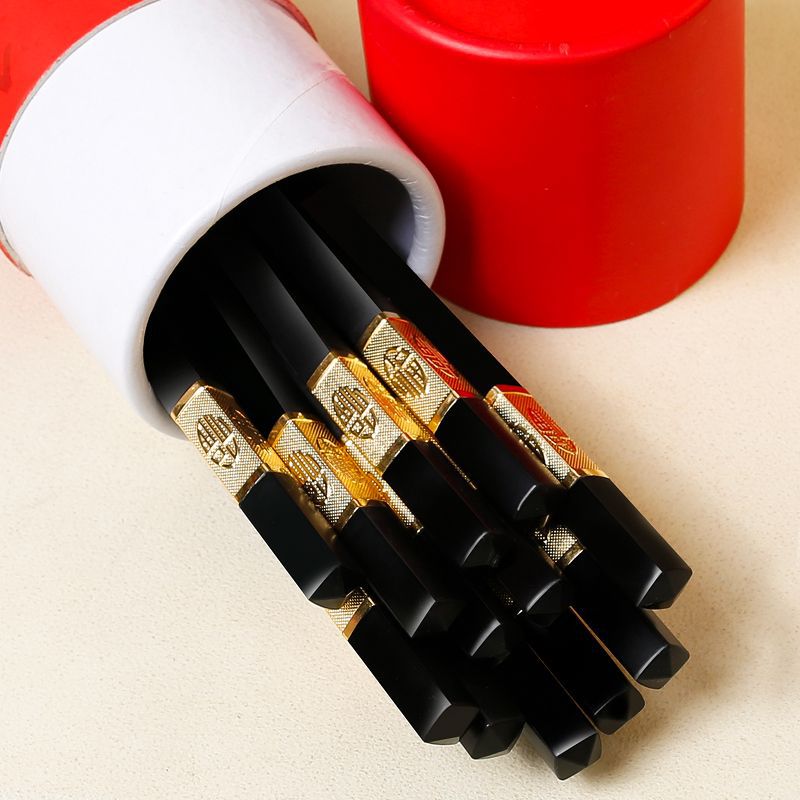 Juego de palillos de regalo de estilo de marea nacional, palillos de madera de ala de pollo, rojo chino, festivo, traje de cilindro de firma cara, suministro rápido al por mayor