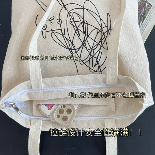 Niche personality graffiti design cute cat one-shoulder canvas bag women's summer portable commuting bag