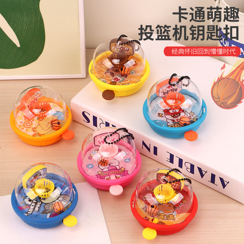 Cross-border creative cartoon shooting keychain desktop decompression cheap small toy pendant doll machine small gift wholesale