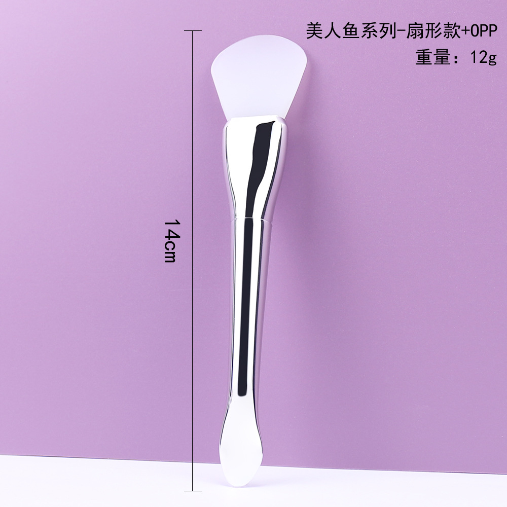 Cepillo de mascarilla de silicona en forma de abanico de cola de pez todo en uno plateado