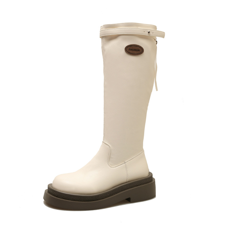 フランスの白いブーツの女性は膝の厚い底のファッション靴のカジュアルなブーツの後でファスナーの長靴の現物の卸売りをします。