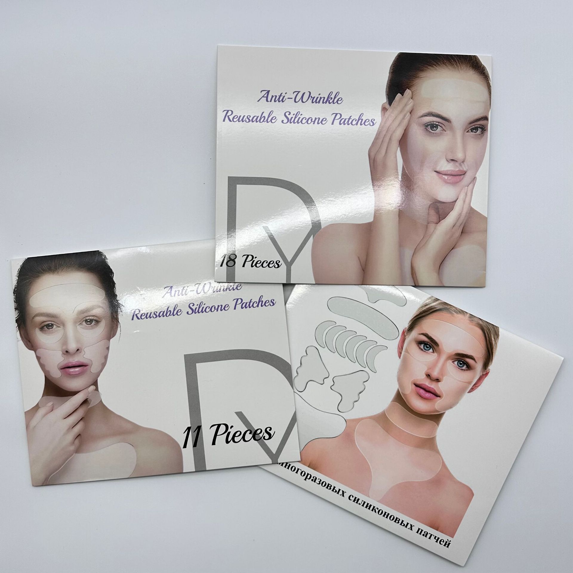 Pegatinas de frente antiarrugas de silicona de fábrica Pegatinas de cara de 11 piezas con embalaje de caja de color Pegatinas de cuello Pegatinas de barbilla Levantamiento y apriete