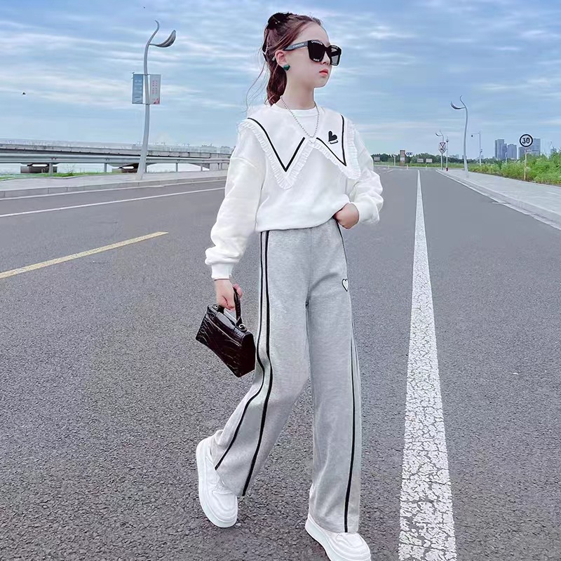 Niñas 2023 nueva primavera y otoño Net Red Pantalones de estilo occidental niños medianos y grandes Pantalones acampanados de pierna ancha deportivos de estilo coreano