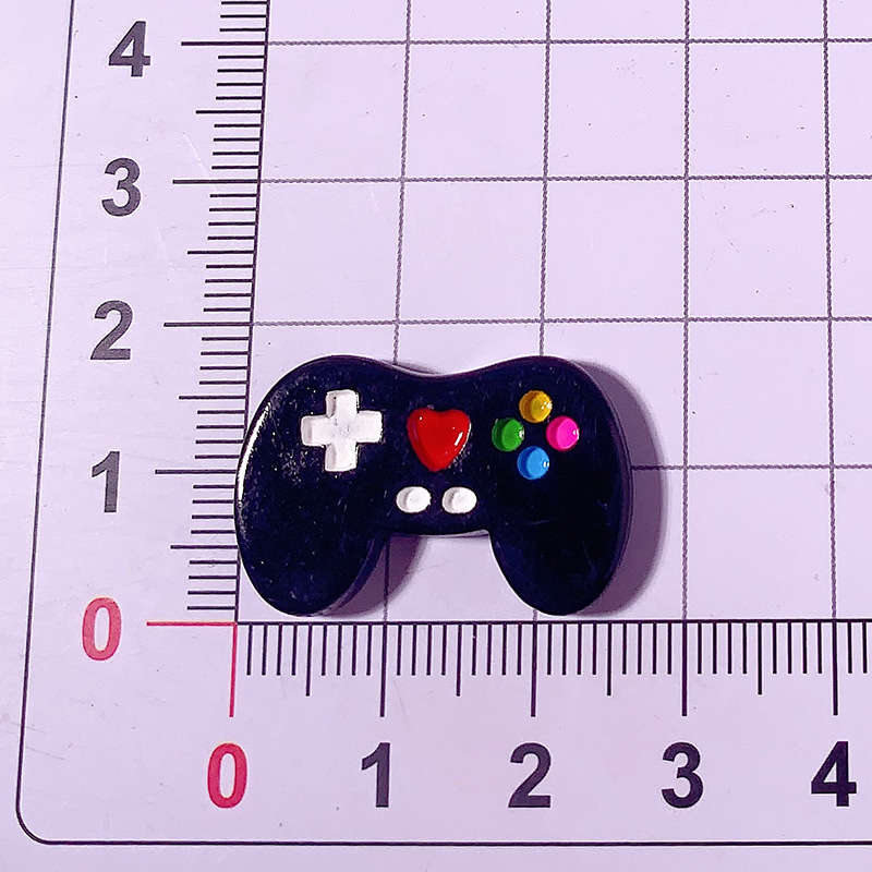 Simulación transfronteriza en blanco y negro mango de máquina de juegos DIY accesorios de resina cabello caja de papelería hebilla de zapato material de parche