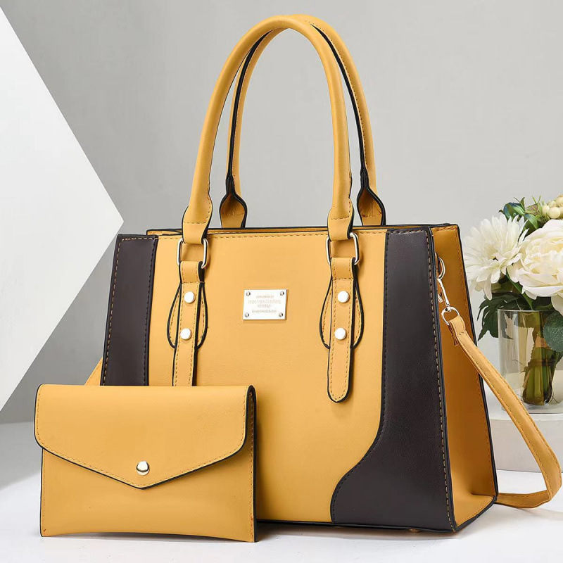 Dos paquetes de bolsas de niños 2025 moda nueva mujer mochila de hombro bolsas de mano versátiles bolsas transfronterizas