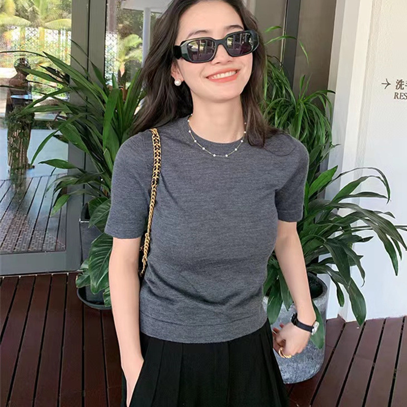 Summer ultra thin woolen solid sweater with a round collar