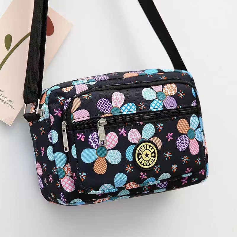Bolsa de tela de flores bolsa de mensajero de las mujeres nueva bolsa de Madre de gran capacidad bolsa de hombro individual de mediana edad y ancianos bolsa de tela Oxford bolsa