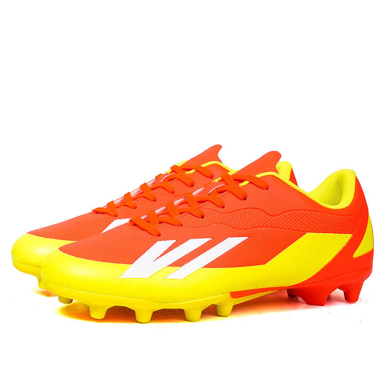 2025 zapatos de fútbol nuevo color juvenil anti-deslizante hombre y mujer AG clavos largos de césped estudiantes fabricantes transfronterizos