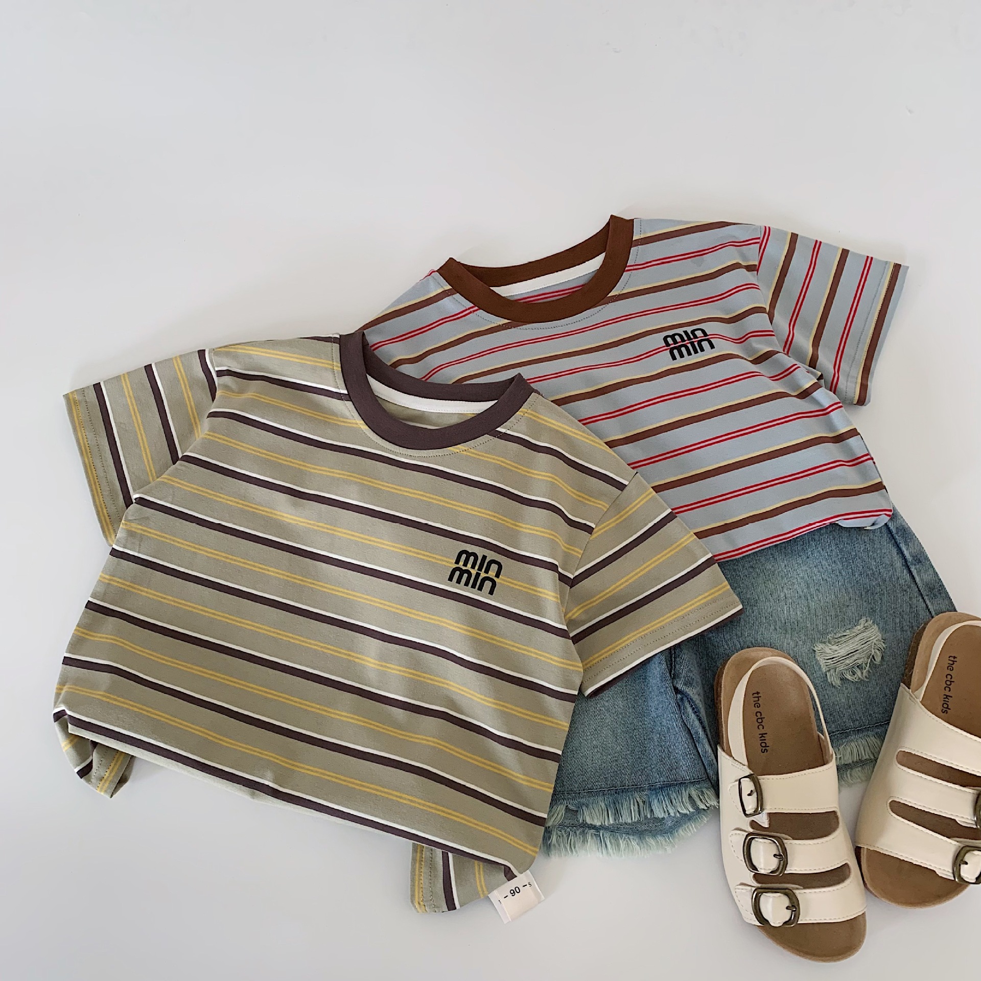 Mai Bao camiseta infantil 2025 verano nuevo estilo coreano para niños y niñas a rayas de mangas cortas jersey bebé ropa interior de tela t