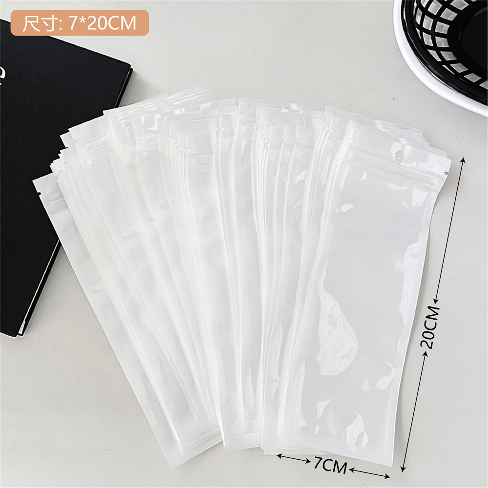 Colección de bolsas opp transparentes, cabeza de tarjeta, bolsa de embalaje trasera, bolsa de joyería pequeña, bolsa autoadhesiva con orificio colgante, bolsa de embalaje de plástico al por mayor