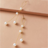 Design long earrings from pearl, silver 925 sample, trend of season