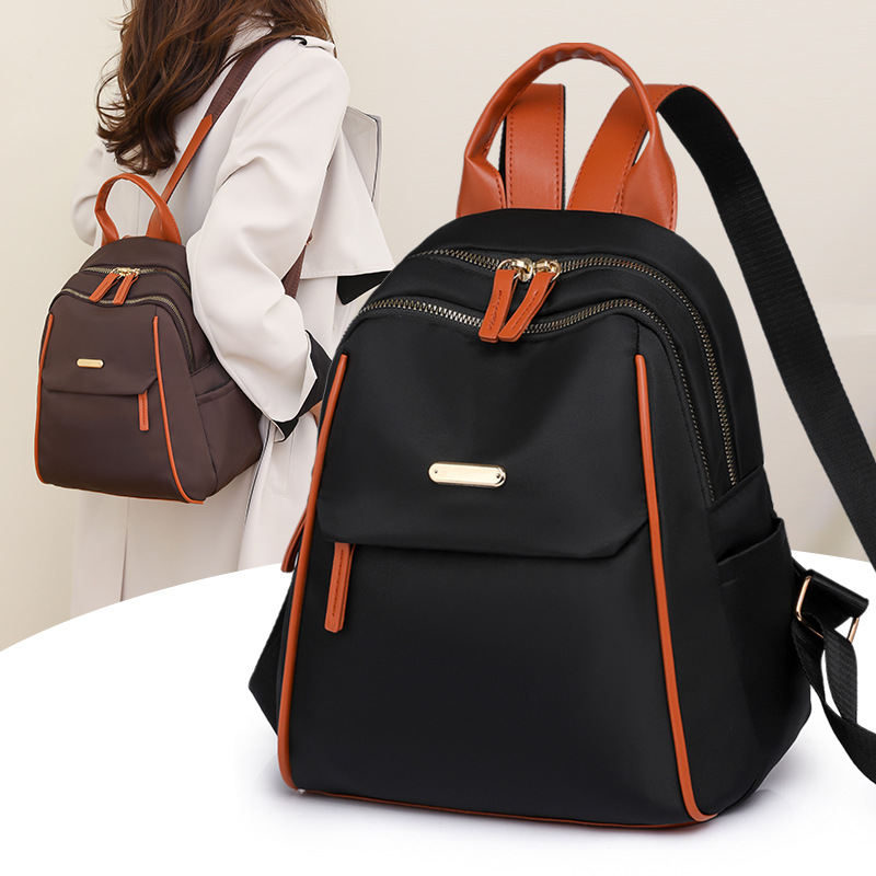 Mochila ligera de viaje para mujer 2024 nueva moda en contraste color Oxford tela pequeña mochila para mujer mochila al por mayor