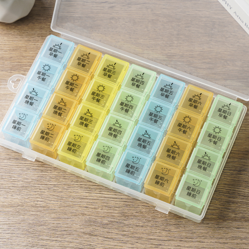 Caja de medicamentos portátil al por mayor de fábrica, caja de PP para el hogar, caja de medicamentos dividida para 7 días, caja sellada a prueba de olores, caja de medicamentos transparente portátil