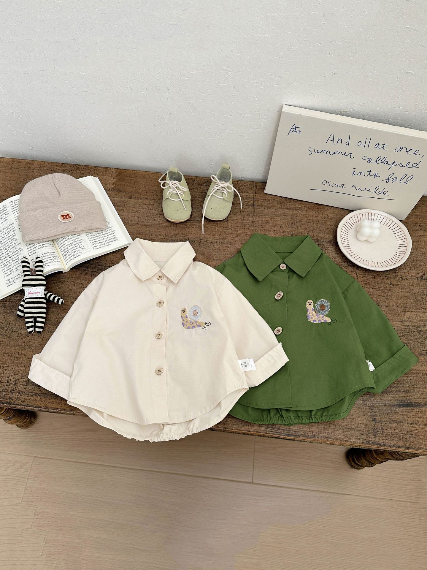 Ropa de bebé coreana 2026 nuevo bebé guapo camisa de algodón puro otoño impresión coreana de camisa de manga larga para niños