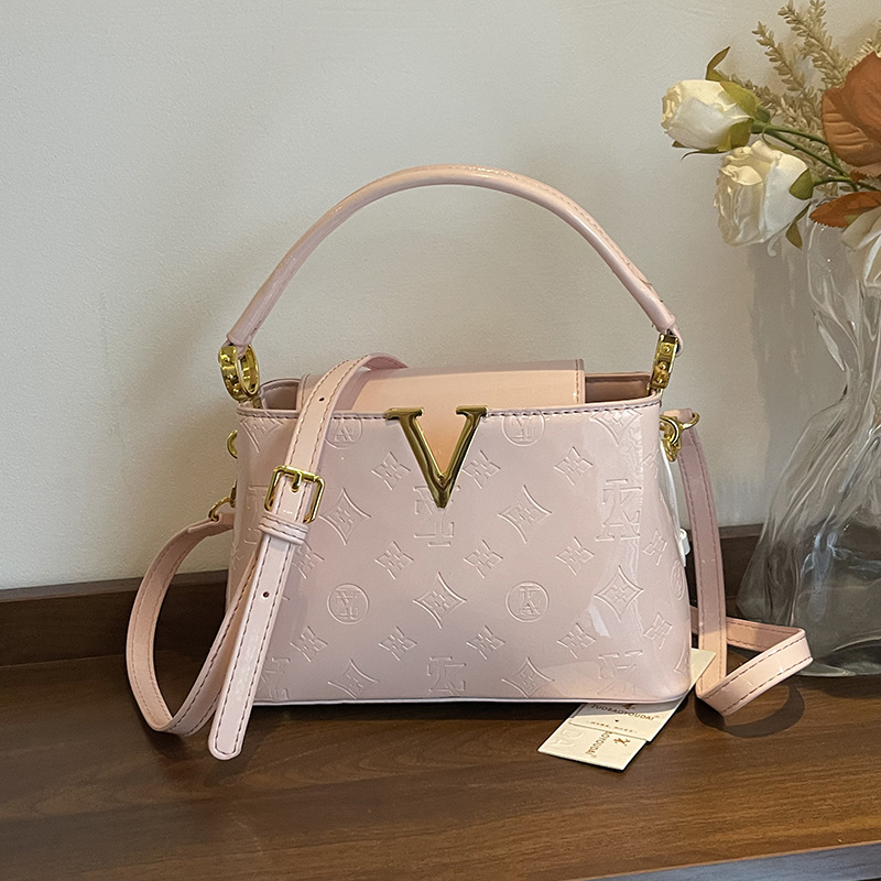 Bolso de alta calidad con textura 2025 verano nuevo bolso femenino con letras en relieve bolso de hombro charol brillante bolso de mensajero marea