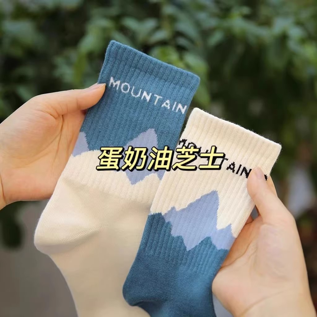 Calcetines asimétricos nicho primavera y otoño de las mujeres ins moda japonesa calle personalidad AB calcetines estudiante masculino pareja calcetines deportivos