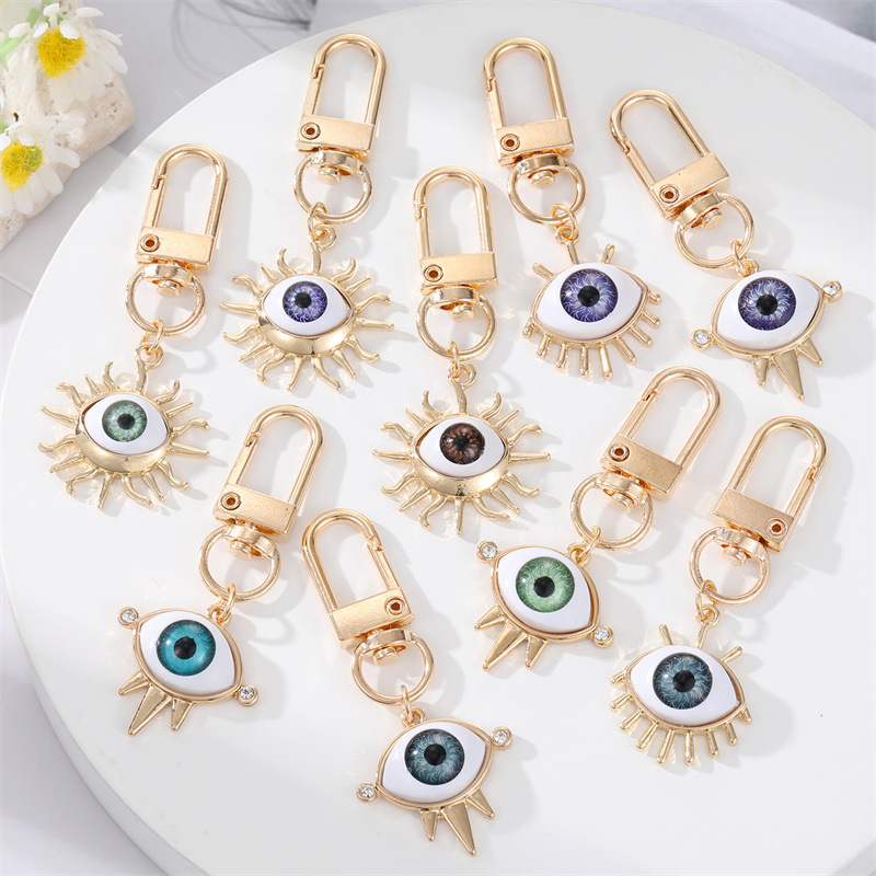 30g Weight Keychain Classification Alloy Material Eye Pattern Unisex Gender Plating Design Fashion Style Multicolor Color Alloy Base Support Diamond-embedded Colorful Devil's Eye Keychain Gold Electroplated Resin Patch Handbag Pendant 1