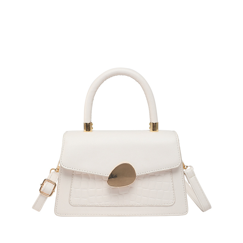 Textura hebilla magnética bolso de moda simple 2025 primavera nuevo estilo ins bolso de mensajero de un solo hombro elegante bolso cuadrado femenino