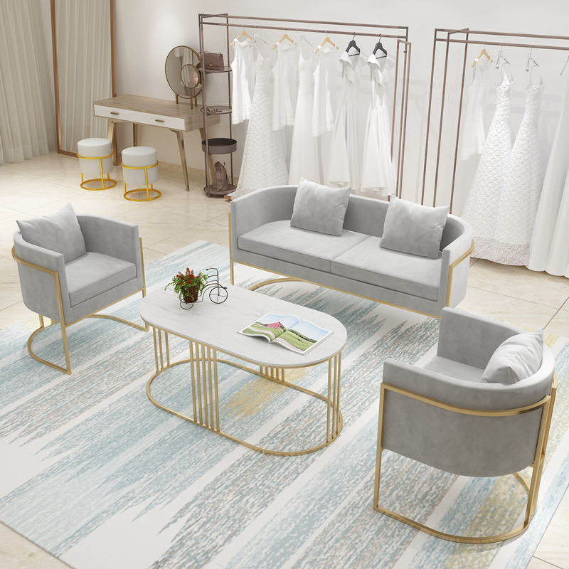 Sofá de hierro forjado nórdico lujoso asiento de tarjeta roja red salón de belleza silla de recepción casual moderna simple combinación de sofá mesa de té