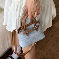 トレンディなポータブルミニバッグ女性のための 2025 夏の新しいニッチシェルバッグファッションショルダークロスボディバッグ携帯電話バッグ