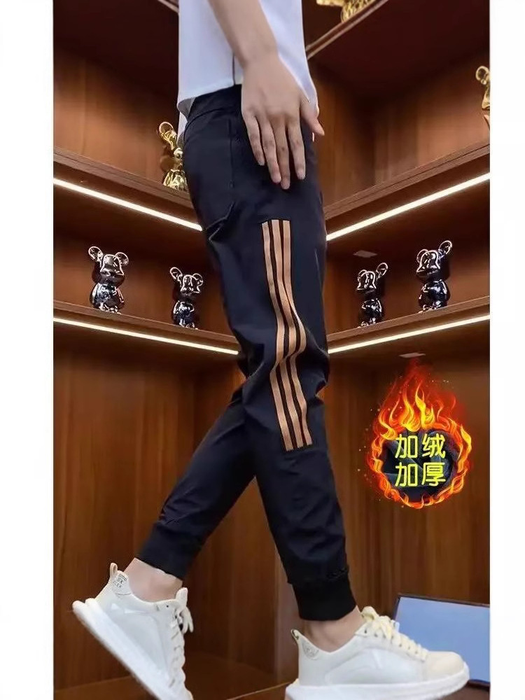 2024秋冬加绒休闲裤男潮牌设计感拼色运动束脚裤百搭黑色小脚男裤