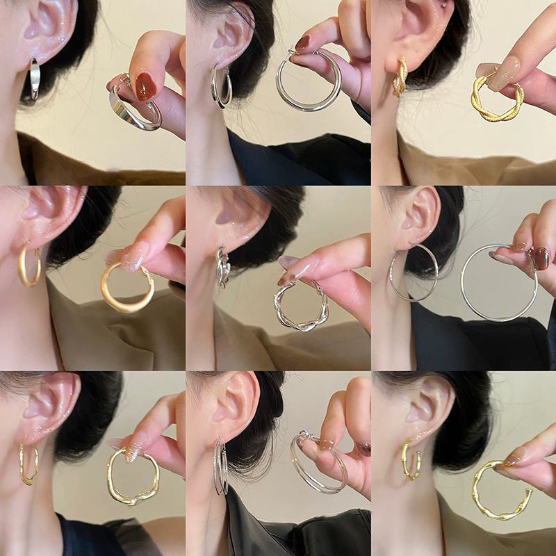 Anillo de metal francés aretes de anillo simple aretes de aretes nuevos estilos de estilo estilo estilo estilo de diseño de nicho temperamento único aretes de mujer cara pequeña