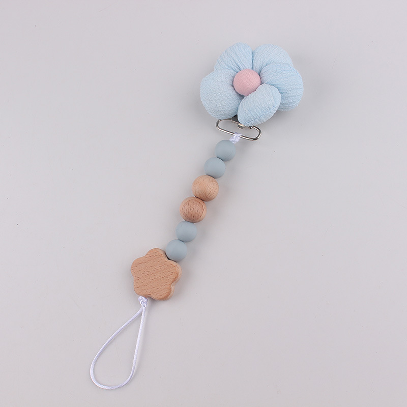 Productos para bebés pacificadores de tetas anti-caída cadena INS cadena de diente de viento flor de madera
