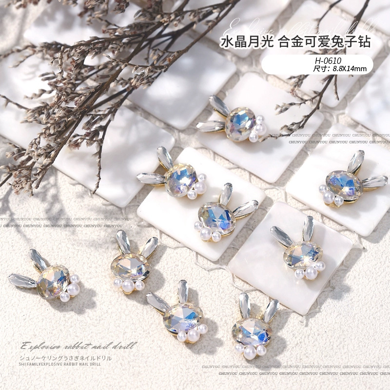Nuevo acabado lindo flash conejo aleación diamante conejito cabeza perla pila diamante combinación manicura uñas joyería diamante
