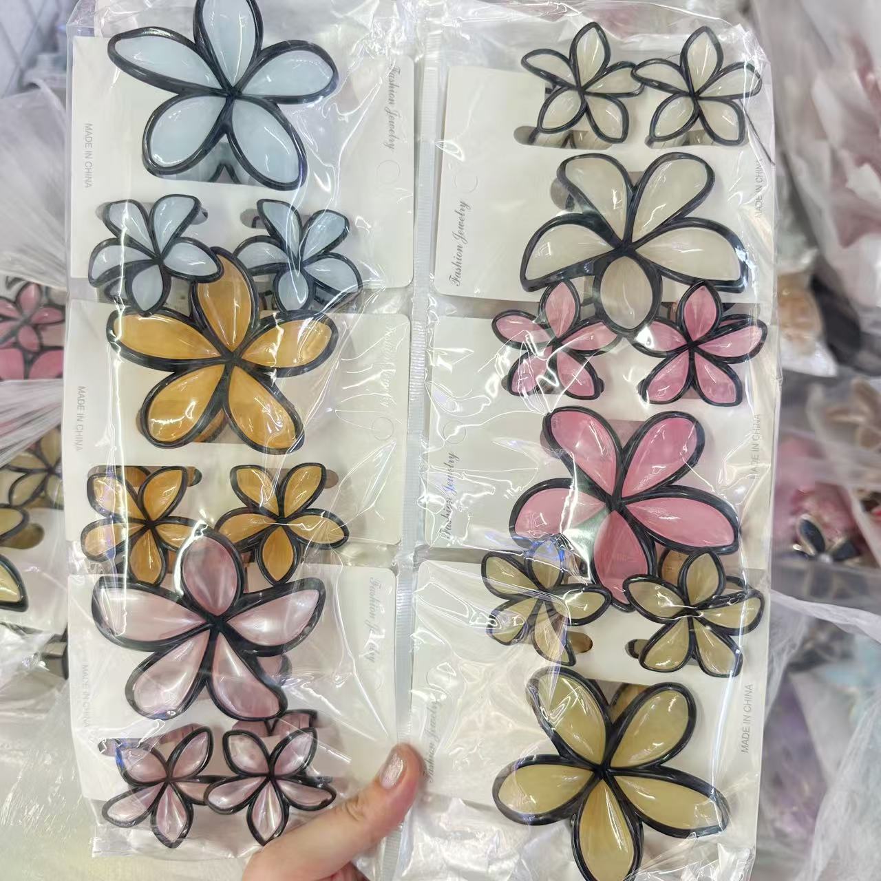 Europa y los Estados Unidos explotaron 8CM huevo flores clip de cabello de alta calidad para mujeres agarrar el cabello de tiburón color caramelo transfronterizo agarrar clip de cabello