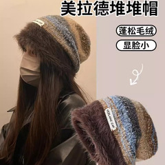 秋冬の女性のぬいぐるみのレトロなニットの山の帽子の子供は顔が小さいです。