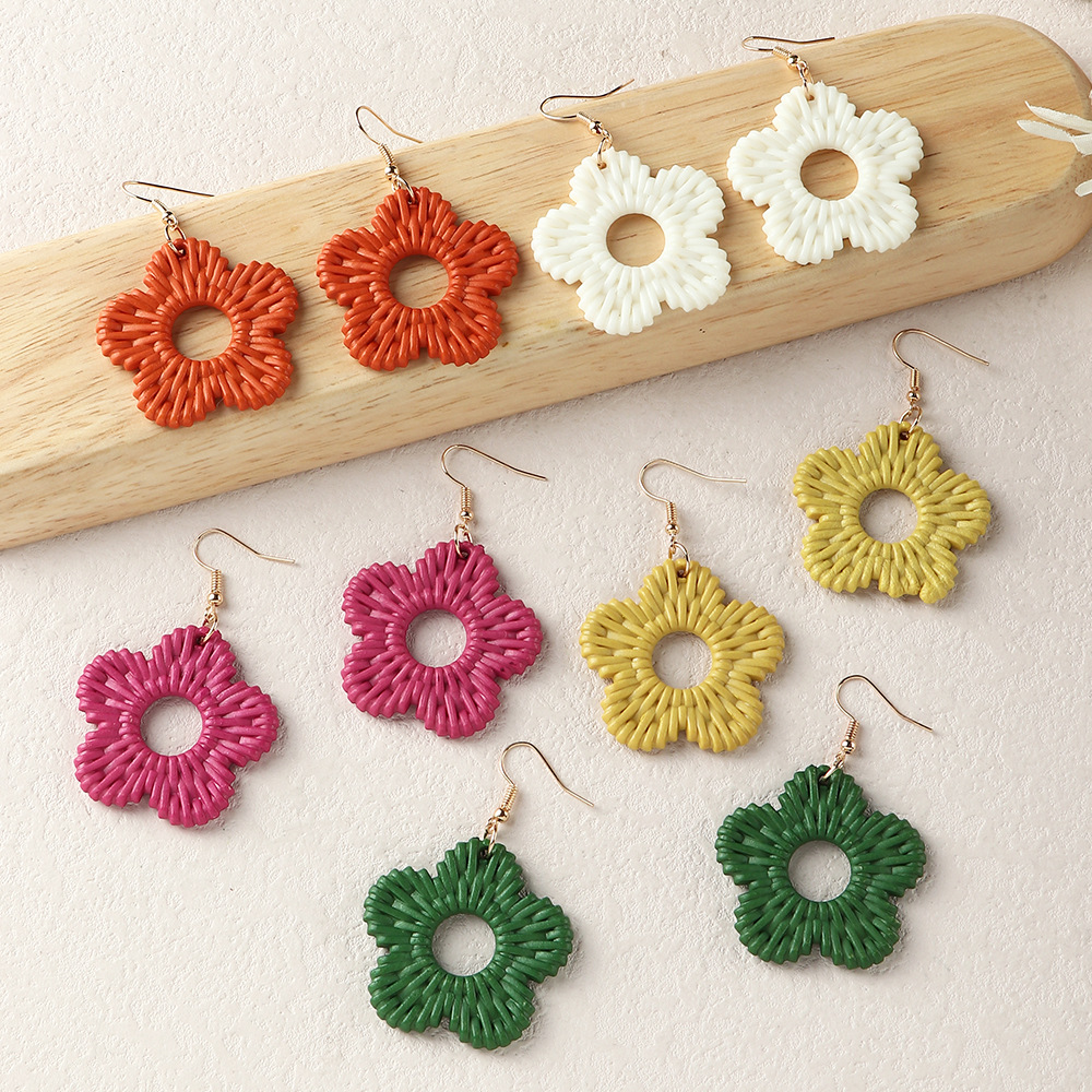 Fashion Solid Color Hollow Flower Bamboo Rattan Straw Drop Earrings display picture 1