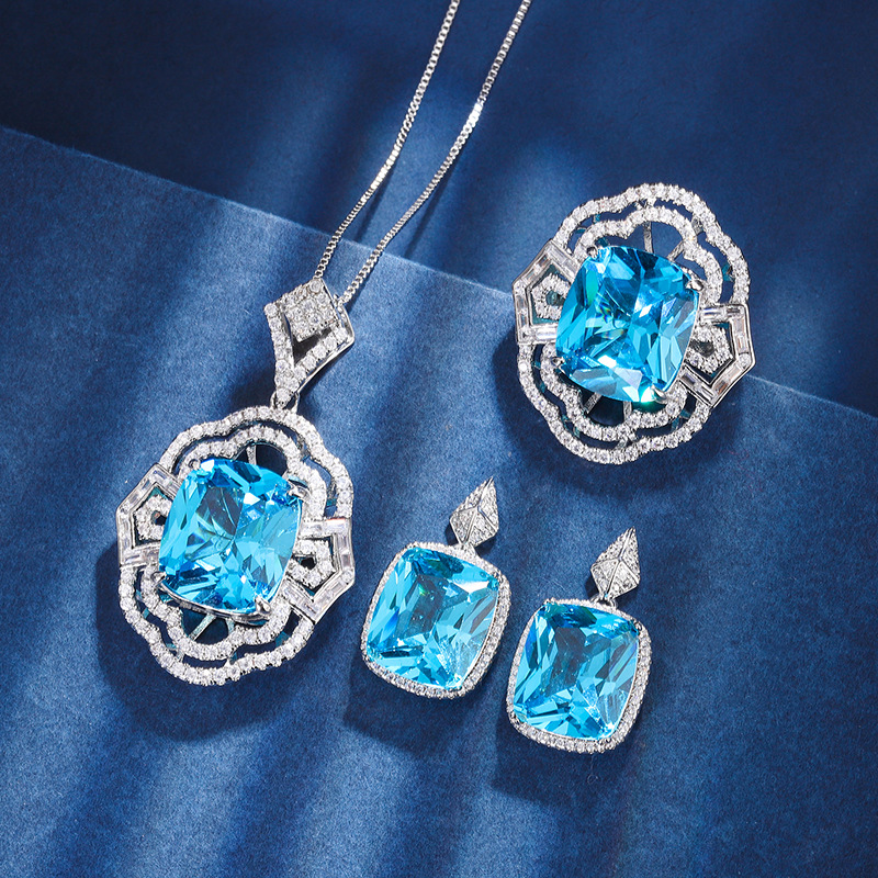 Zhuang Sheng joyería fondo de cobre chapado en oro simulación aguamarina hueco conjunto de las mujeres colgante anillo 4*16 espárragos 12*14