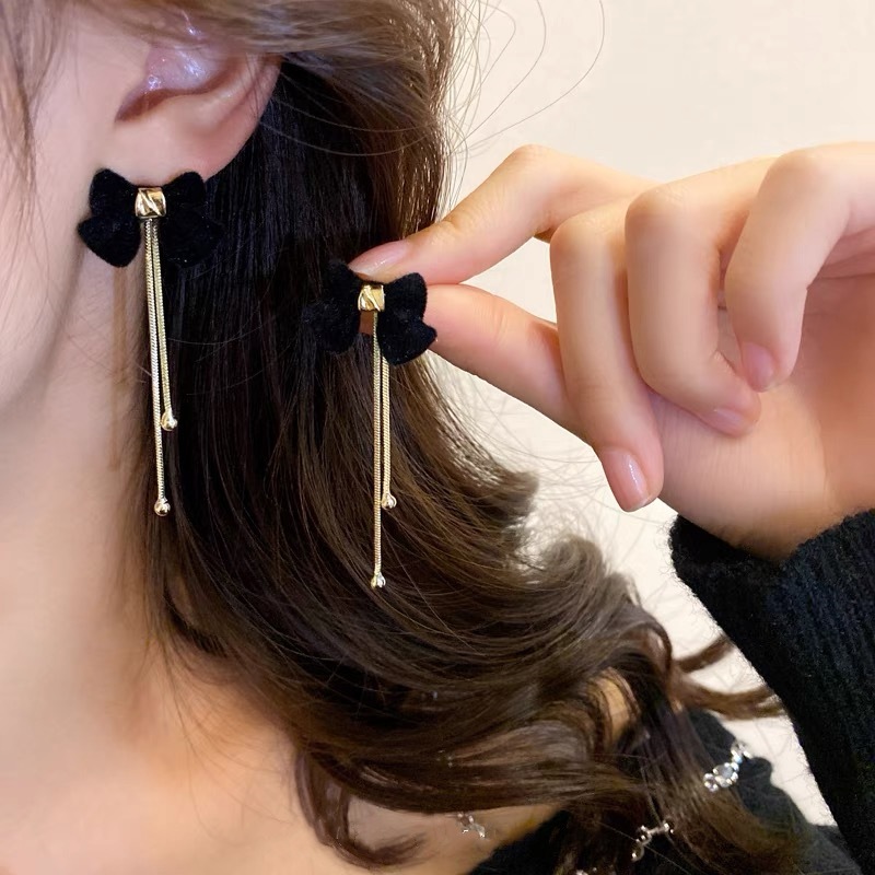 Fashionable red elegant earrings with bow with tassels