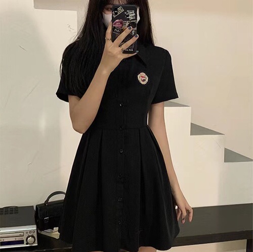 Summer college style French black suit dress with clever waist cinching A-line short skirt