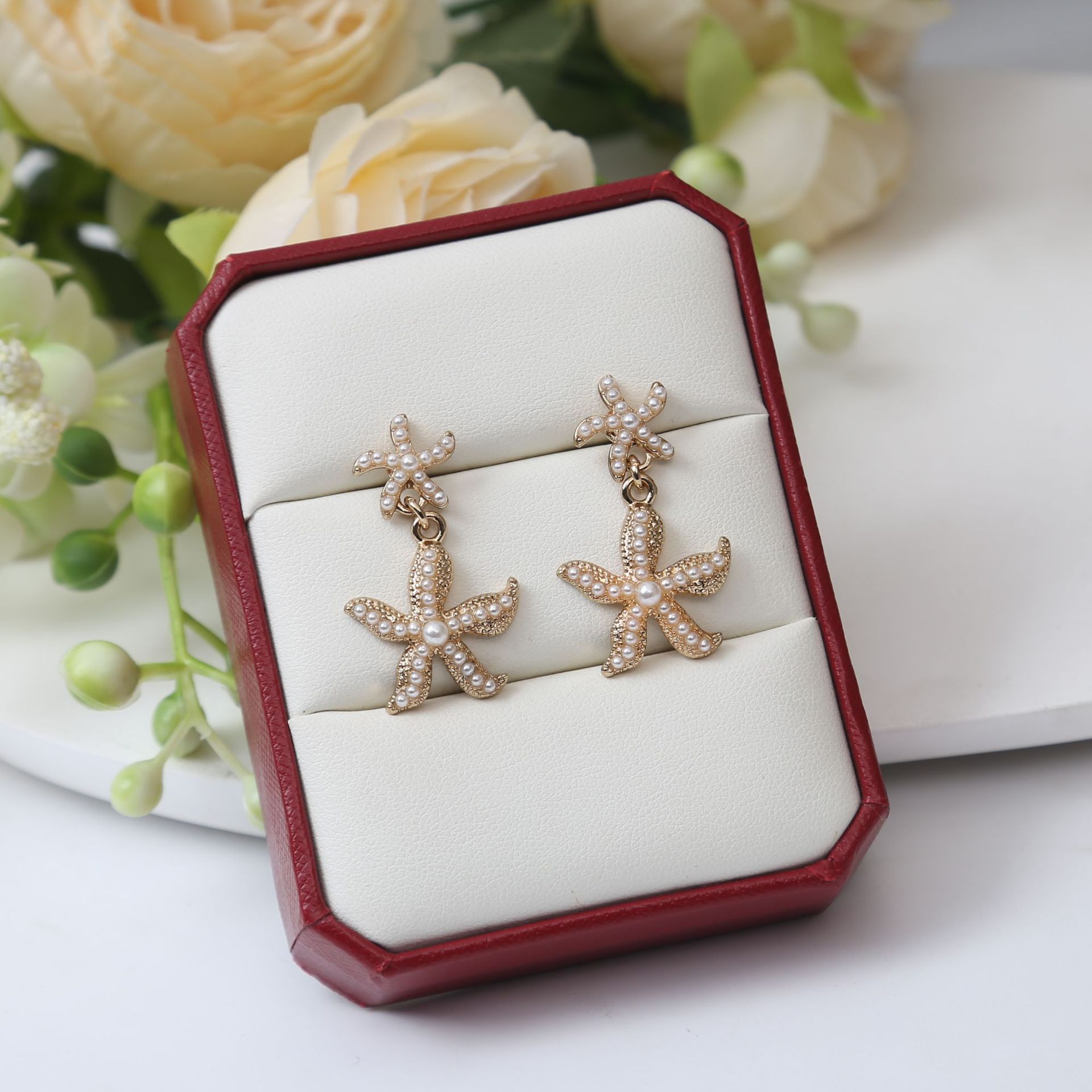 Nueva borla pendientes en línea celebridad diamante mariposa flor S925 pendientes de perlas moda elegante pendientes largos de adelgazamiento