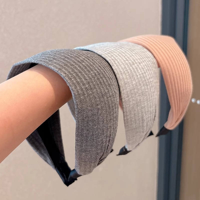 Red celebridad similar banda de bordes anchos de punto de alta sensación de estilo extranjero lavado facial de presión banda de cabello simple alta cráneo clip de cabello