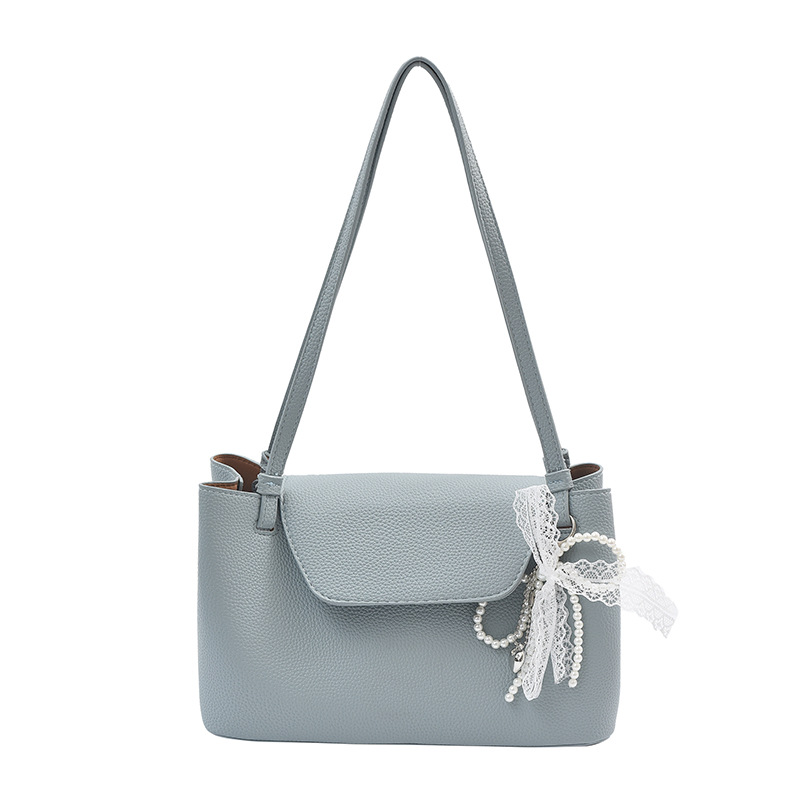 Bolso Tote de cercanías todo-fósforo de nicho retro transfronterizo para mujer 2025 primavera nuevo estilo estilo occidental bolso de axila de un solo hombro de gran capacidad