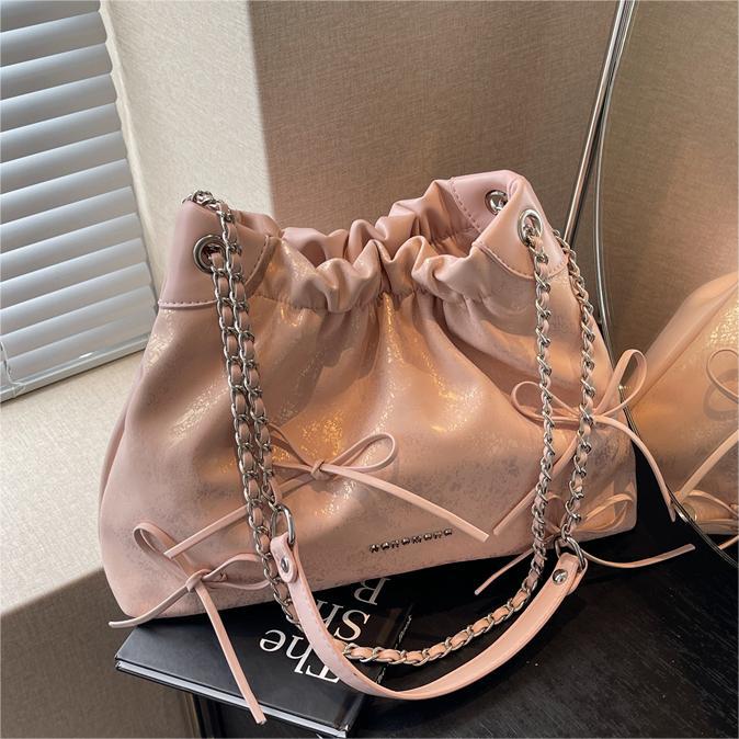 Bolsa de arco de moda explosiva para mujeres 2024 verano nuevo simple versátil bolso de brazo bolso de tendencia de viaje