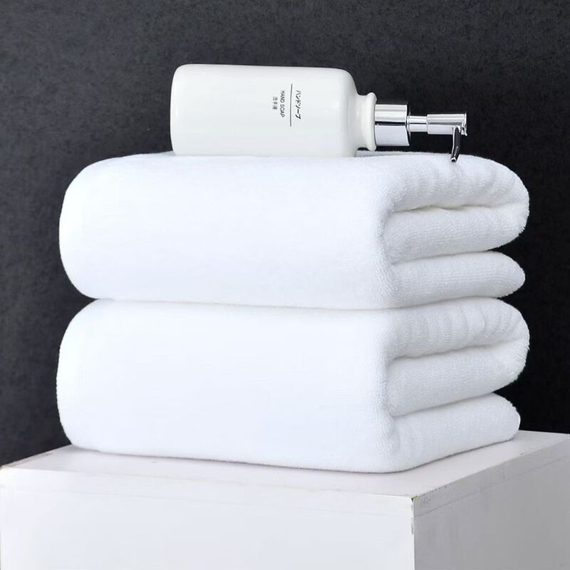 Egyptian cotton hotel pure cotton bath towel, extra-large white, made of thick, soft, and absorbent cotton material, suitable for hotels and guesthouses Egyptian cotton hotel pure cotton bath towel, extra-large white, made of thick, soft, and absorbent cotton material, suitable for hotels and guesthouses