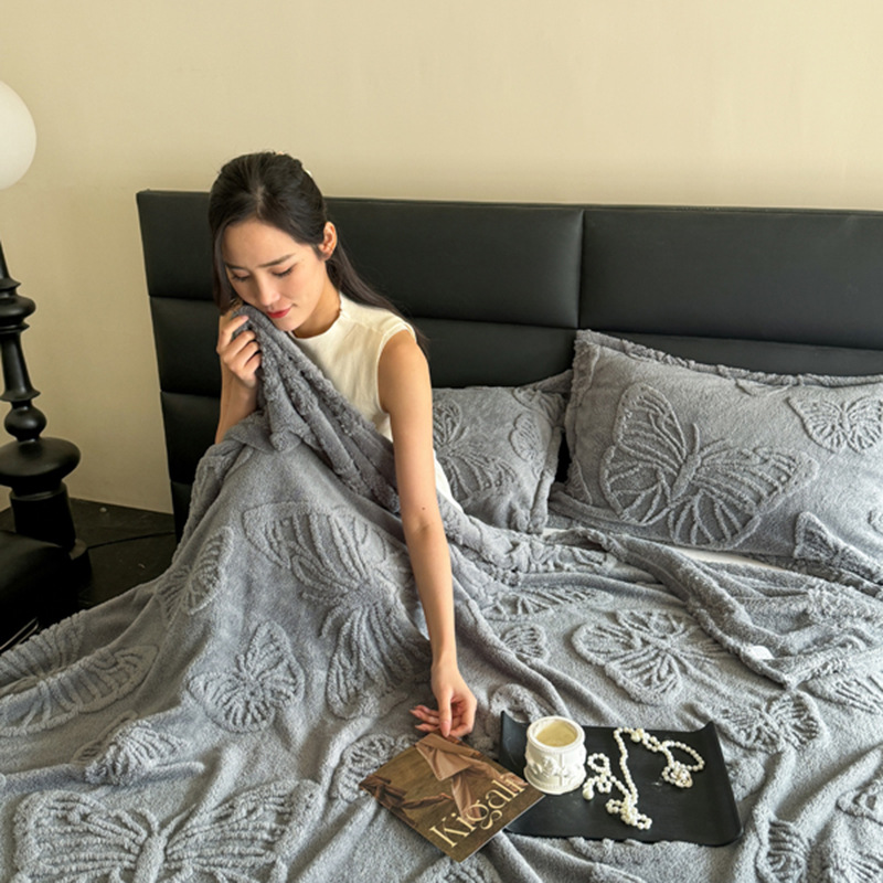 Torre de viento de lujo ligero transfronterizo Fufu terciopelo color sólido jacquard multifunción manta manta manta de sofá de mariposa jacquard de una sola capa manta al por mayor