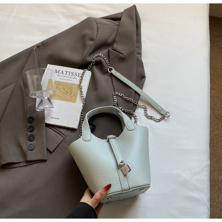 Bolso de madre de cubo de ocio simple para mujer 2025 versión coreana del nuevo bolso de mensajero exquisito de textura de moda ins
